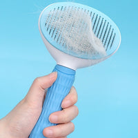 Brosse pour chien autonettoyante